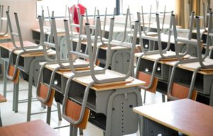 School cleaning workers clean sanitize and remove trash